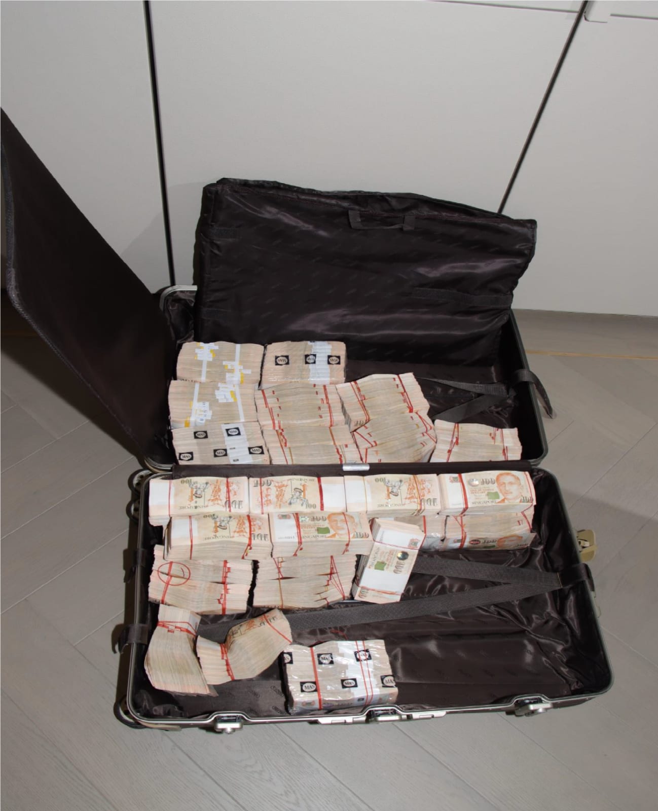 Who are the 10 foreigners arrested in Singapore's massive S1 billion